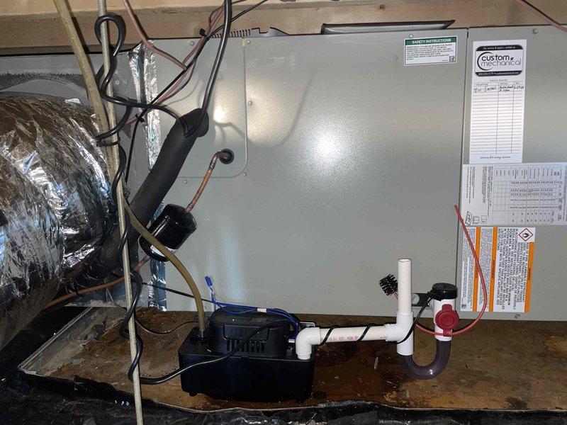 Completed full HVAC system replacement including removal and disposal of existing equipment. Installed 5A6H7036 3-ton 17 SEER heat pump outdoor unit on platform with whip and disconnect. Installed 5TEM6D04 variable speed fan coil unit in attic with BAYHTR1715BRKR 15KW electric heater with breaker. Integrated Honeywell HZ432 zone control board utilizing existing dampers for multi-zone operation. Installed condensation pump with PVC drainage system for proper condensate removal. Flushed, pressure tested, and recharged refrigeration lines to manufacturer specifications. Installed Honeywell TH6320WF WiFi thermostat for first floor zone control and remote access capability. All electrical connections completed with proper disconnects and surge protection. System tested and verified operational across all zones with proper airflow, refrigerant charge, and heating/cooling performance.