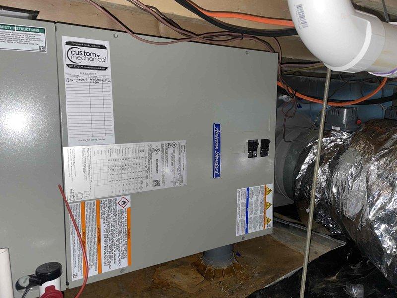 Completed full HVAC system replacement including removal and disposal of existing equipment. Installed 5A6H7036 3-ton 17 SEER heat pump outdoor unit on platform with whip and disconnect. Installed 5TEM6D04 variable speed fan coil unit in attic with BAYHTR1715BRKR 15KW electric heater with breaker. Integrated Honeywell HZ432 zone control board utilizing existing dampers for multi-zone operation. Installed condensation pump with PVC drainage system for proper condensate removal. Flushed, pressure tested, and recharged refrigeration lines to manufacturer specifications. Installed Honeywell TH6320WF WiFi thermostat for first floor zone control and remote access capability. All electrical connections completed with proper disconnects and surge protection. System tested and verified operational across all zones with proper airflow, refrigerant charge, and heating/cooling performance.