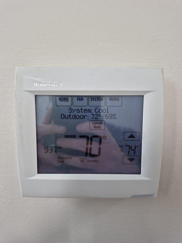 Completed platinum membership maintenance service on single HVAC unit. Performed comprehensive system inspection including electrical component testing using digital multimeter to verify proper voltage and amperage readings at capacitor (200 MFD) and control board connections. All electrical connections tested within normal operating parameters. Verified thermostat operation and programming on Honeywell programmable unit, confirming accurate temperature readings and system mode functionality. System currently operating in cooling mode with proper temperature control and humidity levels. All components functioning as designed with no deficiencies noted during inspection.