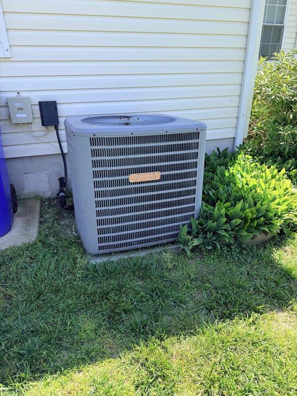 Conducted on-site evaluation of existing HVAC system for replacement estimate. Assessed outdoor condensing unit located on grade-level pad adjacent to structure, noting unit specifications and current operating condition. Inspected electrical service components including exterior disconnect box and associated conduit routing. Evaluated main electrical panel configuration, verified available amperage capacity, and documented existing circuit breaker arrangement to ensure compatibility with proposed replacement equipment. Provided comprehensive system replacement recommendations based on current equipment assessment and electrical infrastructure review.