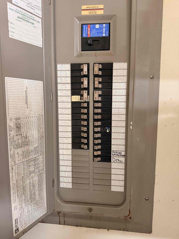 Conducted on-site evaluation of existing HVAC system for replacement estimate. Assessed outdoor condensing unit located on grade-level pad adjacent to structure, noting unit specifications and current operating condition. Inspected electrical service components including exterior disconnect box and associated conduit routing. Evaluated main electrical panel configuration, verified available amperage capacity, and documented existing circuit breaker arrangement to ensure compatibility with proposed replacement equipment. Provided comprehensive system replacement recommendations based on current equipment assessment and electrical infrastructure review.