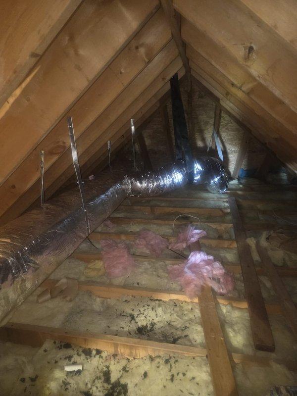 Removed old, damaged ductwork and flexible lines from upper floor attic space. Installed new insulated metal trunk duct with flexible run-outs to all accessible areas in attic. Sealed all new duct connections with hard cast mastic tape. Reused existing HVAC equipment, boots, and registers. System tested and operational upon completion.