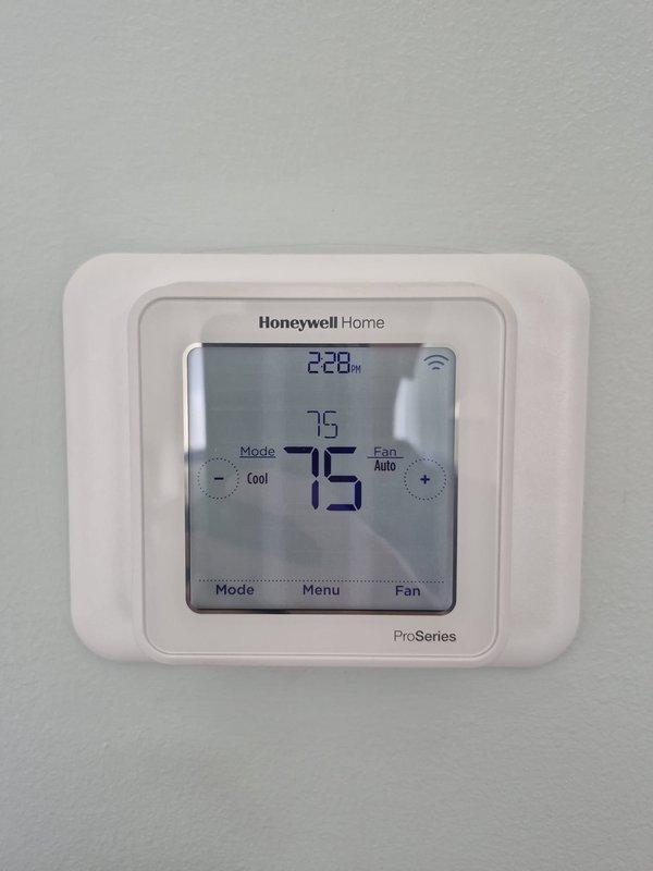 Completed Platinum membership maintenance service on two HVAC systems. Performed comprehensive system inspections including thermostat functionality verification on Honeywell Home ProSeries unit, electrical diagnostics using clamp meter to measure amperage and voltage readings, and capacitor testing showing 40/5uF dual run capacitor operating within specifications. All systems found operating properly with no deficiencies noted at time of service.