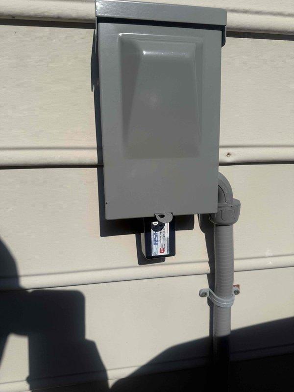 Responded to callback for noisy outdoor unit and surge protector verification. Inspected ODU and confirmed surge protector was properly installed on the electrical disconnect box as per original contract specifications. Measured operational sound levels at 35dB, which falls within normal operating parameters for this equipment. Documented surge protector installation with photos for customer records and confirmed system is operating as designed with no abnormal noise conditions present.