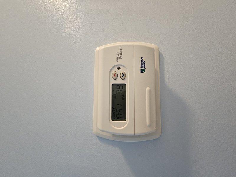 Responded to no cooling call on residential HVAC system over 10 years old. Upon arrival, unit was blowing warm air and had been shut off by occupant. Performed diagnostic assessment and documented system conditions with photos of thermostat displaying 71 degrees and equipment access area. Coordinated with property owner via phone communication during service visit to discuss findings and necessary repairs.