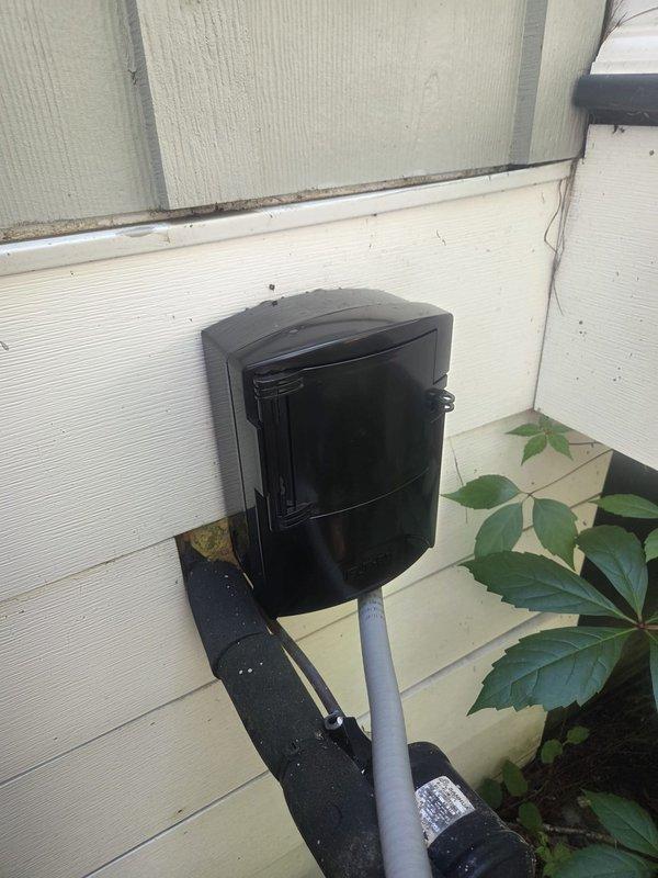 Responded to no cooling call. Upon arrival, inspected outdoor unit and electrical disconnect box mounted on exterior wall. Found disconnect switch in off position. Verified all wire connections were secure and intact within the weathered disconnect enclosure. Restored power by closing disconnect switch. System powered on successfully and began operating normally. Confirmed cold air delivery at indoor registers. Unit returned to proper cooling operation.