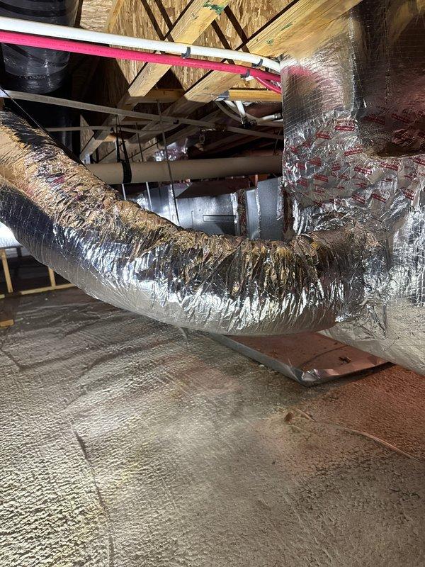 Installed complete HVAC zoning system including HZ432 zone control board, two ZD10X10 dampers, one ZDZ0X14 damper, and CPRD8 8" bypass damper in attic space. Mounted THM5320R100 equipment interface module and THM4000R1000 wireless adapter to enable wireless thermostat communication. Installed TH5320R1002/U Wireless FocusPro and TH8321R10001/U programmable thermostats to provide independent temperature control for multiple zones throughout the residence. All zone dampers properly wired to control board, bypass damper installed to maintain proper static pressure within ductwork system, and wireless components paired and tested for reliable communication. System commissioned with all zones responding correctly to thermostat calls, dampers opening and closing as programmed, and bypass damper functioning to prevent over-pressurization. One-year labor warranty provided on installation.