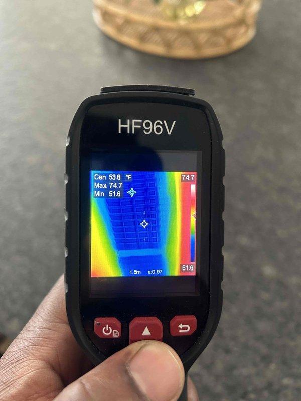 Responded to no cooling complaint on lower level system in multi-zone residence. Found outdoor unit operating but no cool air delivery from vents. Upon investigation, discovered one air handler making abnormal noise after shutdown, indicating possible mechanical failure. Performed thermal imaging diagnostics showing significant temperature differential at supply registers (51.8°F-74.7°F range), confirming inadequate cooling performance. Tested electrical connections and control wiring at air handler terminal board. Advised customer to shut off breaker to affected unit to prevent further damage until repairs could be completed.