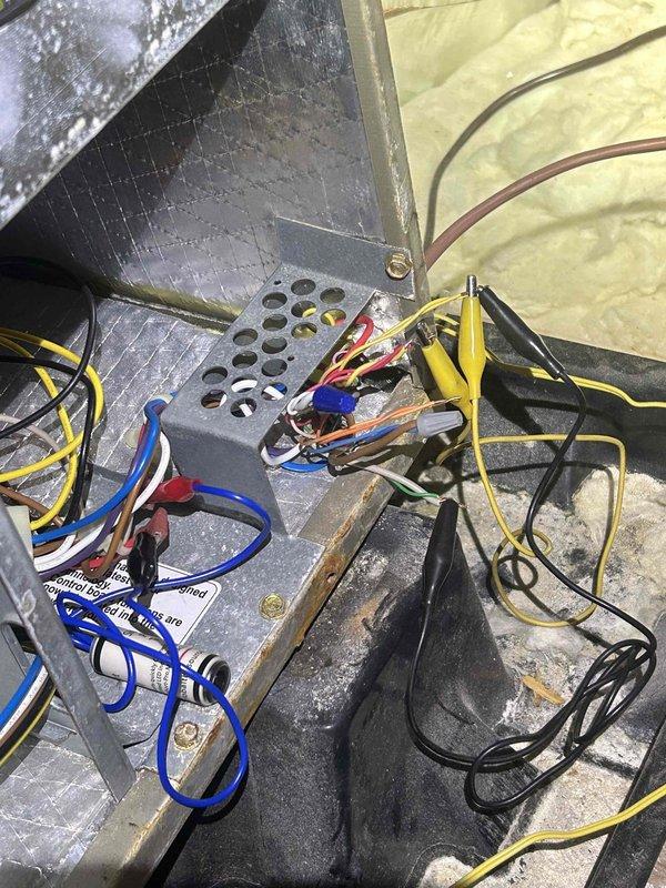 Responded to no cooling complaint on lower level system in multi-zone residence. Found outdoor unit operating but no cool air delivery from vents. Upon investigation, discovered one air handler making abnormal noise after shutdown, indicating possible mechanical failure. Performed thermal imaging diagnostics showing significant temperature differential at supply registers (51.8°F-74.7°F range), confirming inadequate cooling performance. Tested electrical connections and control wiring at air handler terminal board. Advised customer to shut off breaker to affected unit to prevent further damage until repairs could be completed.