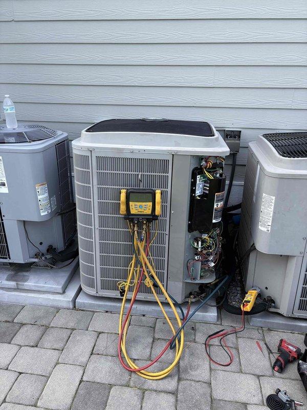 Responded to service call for thermostat reporting an 84 lockout error code. Performed preventive maintenance tune-up on HVAC system, which included removing unit side panel for access, testing electrical components with multimeter, checking refrigerant pressures and connections using manifold gauges, and inspecting condensate drainage system including PVC piping. All systems tested within normal operating parameters following service completion, lockout condition cleared, and unit returned to normal operation.