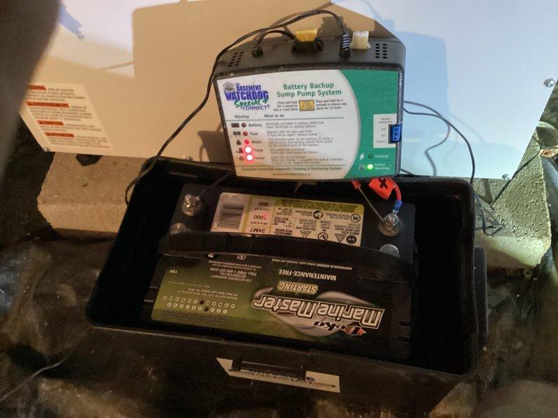 Responded to service call regarding improperly installed sump pump discharge piping from previous contractor's work. Upon arrival, inspected existing Basement Watchdog battery backup sump pump system with MarineMaster marine battery in crawl space. Documented current installation with photographs showing PVC discharge piping configuration, pump basin setup, and electrical connections. Assessed piping layout and system components to determine scope of corrections needed. Provided customer with detailed explanation of issues identified and presented options for proper remediation of discharge line installation to meet code requirements and ensure reliable system operation.