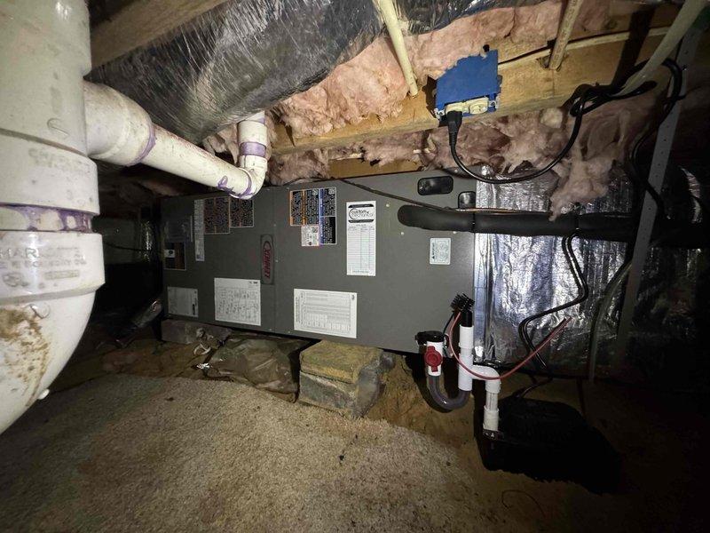 Completed full HVAC system replacement including removal and disposal of old equipment. Installed Lennox ML14KP1-036 3-ton 14 SEER heat pump on pressure-treated wood platform with new outdoor disconnect and electrical whip. Installed Lennox CBK45UHET-036 air handler in crawlspace with 10 kW electric heat pack and Honeywell digital thermostat. Fabricated and installed metal duct transitions to adapt new equipment to existing ductwork. Reused existing electrical service, condensate drain lines, and power connections where applicable. Filter grille location: 14x30x1. All equipment tested and operational upon completion.