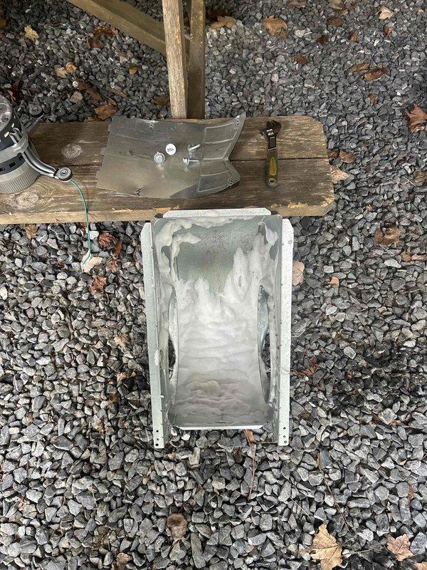 Responded to no cooling complaint for upstairs zone reading 80°F on thermostat. Performed diagnostic testing of system components using digital measurement instruments in attic space. Inspected supply ductwork, insulation, and air distribution system; removed and evaluated duct components including deflector shield and mounting hardware to assess airflow restrictions and system performance issues.