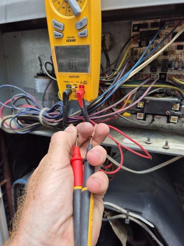 # HVAC Service Report

Responded to no cooling complaint on residential HVAC system less than 10 years old. Upon arrival, discovered front access door to air handler was left open, preventing unit operation due to safety interlock. Verified system fault codes using diagnostic chart and performed electrical testing with digital multimeter to confirm no component failures. Secured access door properly, restored power, and verified normal system operation with cooling cycle initiated successfully.