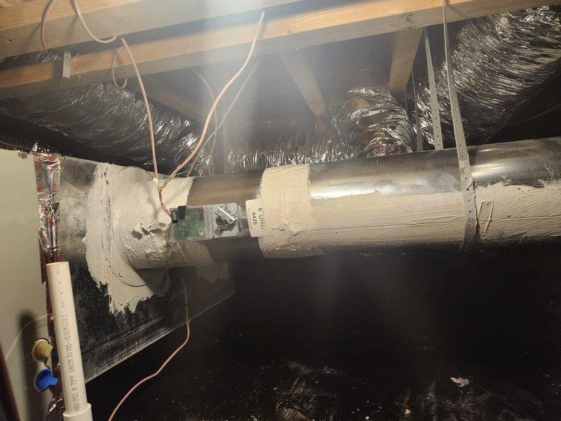 Furnished and installed a complete American Standard zone damper system including ZZONEPNLAC52ZB zone control board, AZON2050 XL1050 main control unit, and AZON1040AC52ZB secondary control. Installed three 10-inch round motorized dampers (EWCURD10) and one 8-inch round motorized damper (EWCURD8) throughout the ductwork system to enable multi-zone temperature control. All dampers were properly wired to the zone control board, tested for proper operation, and integrated with the existing HVAC system to provide independent climate control for designated zones.