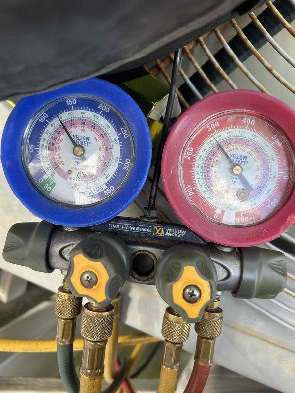 Responded to no cooling complaint on residential air conditioning system. Upon arrival, connected manifold gauges to measure refrigerant pressures and verify system operation. Diagnostic testing revealed system was not maintaining proper operating pressures, preventing adequate cooling performance. Inspected electrical panel and circuit breakers to verify proper power supply to HVAC equipment. System evaluated and customer advised of findings for necessary repairs to restore cooling function.