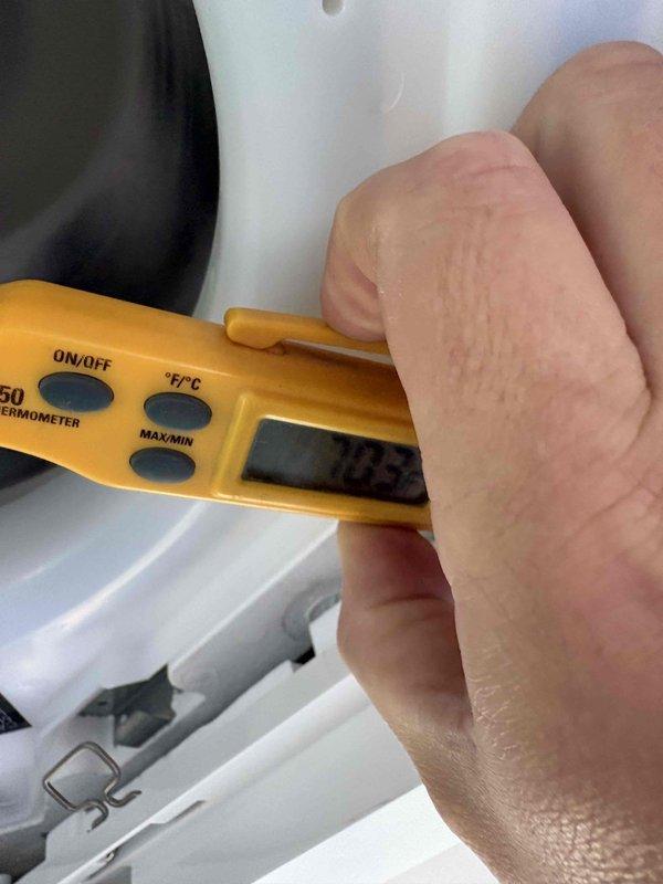 Responded to no cooling call on ductless mini-split system. Upon arrival, unit was inoperative and not responding to commands. Performed diagnostic temperature measurements at indoor unit, recording supply air temperatures of 63°F and 53.2°F at different locations on the unit housing. Verified unit functionality and restored cooling operation to system.
