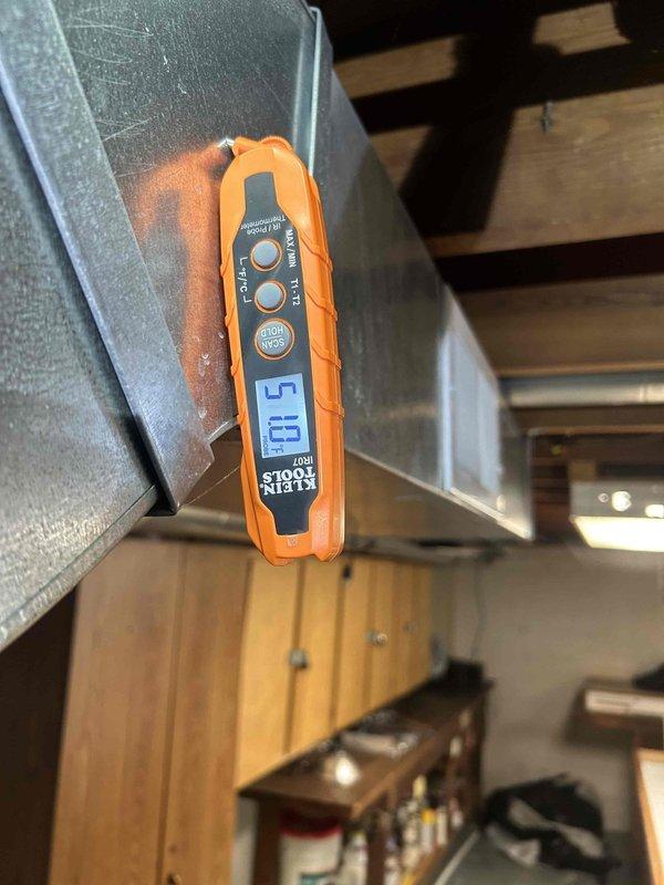 Responded to no cooling complaint on residential HVAC system. Upon arrival, accessed system in utility space and performed diagnostic evaluation. Measured supply air temperature registering 51.87°F, indicating adequate cooling performance. Inspected air filter measuring 16x20x1 and found moderate dust accumulation restricting airflow. Replaced dirty filter with new unit to restore proper system airflow and efficiency. Verified system operation and confirmed adequate cooling delivery throughout occupied space. System returned to normal operation after filter replacement.