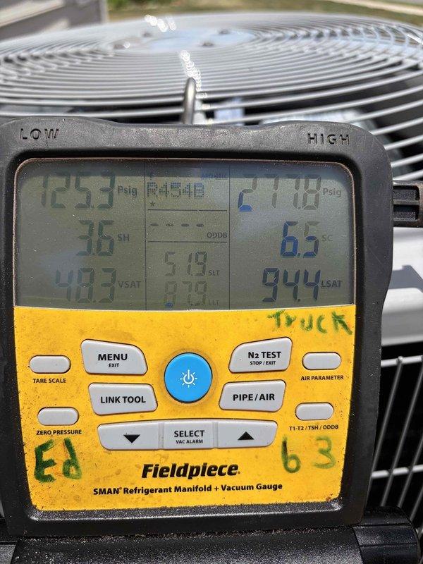 Removed and disposed of existing first-floor air conditioning condenser and evaporator coil. Installed new Carrier 26SCA542 3.5-ton 14.3 SEER outdoor unit on platform with CAAMP4221 evaporator coil connected to existing furnace. Flushed and pressure tested refrigerant lines to verify system integrity, then charged system to manufacturer specifications. Installed 1200 series non-WiFi thermostat to complete half-system replacement. All equipment tested and operational upon completion.