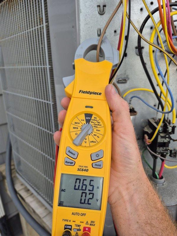 Performed preventive maintenance on multiple cooling systems. Used digital clamp meter to measure electrical amperage and voltage on condenser units, verifying proper compressor and fan motor operation. All systems tested and found operating within normal parameters.