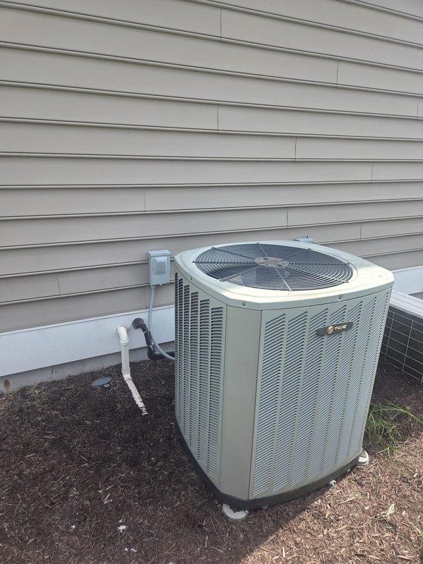 Responded to no cooling complaint on approximately 15-year-old residential HVAC system unable to reach set temperature. Performed diagnostic evaluation of outdoor condenser unit and indoor air handler. Inspected electrical connections at disconnect box, verified proper refrigerant levels, and assessed overall system operation. System returned to normal cooling operation upon completion of service visit.