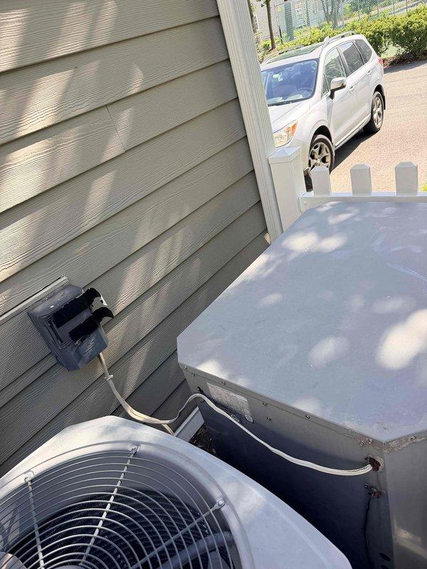 Conducted on-site estimate for complete geothermal system replacement at owner-occupied residence. Evaluated existing non-operational geothermal heat pump system, including outdoor ground loop components and indoor air handler unit. Documented existing equipment specifications, including air handler model FV4CNF005 manufactured December 2011 with 208/230V electrical requirements and R410A refrigerant. Assessed outdoor heat pump unit condition and mounting configuration on concrete pad adjacent to structure. Photographed equipment nameplate data and overall system installation for replacement proposal documentation. Provided customer with comprehensive replacement options and recommendations for new geothermal HVAC system.