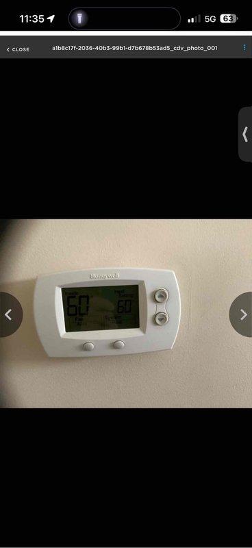 # HVAC Service Call - No Cooling Complaint

Responded to a no cooling complaint on a residential HVAC system over 10 years old. Upon arrival, observed thermostat set to 68°F with actual room temperature reading 60°F, indicating a potential cooling cycle issue. Inspected indoor air handler unit located in confined attic space with insulated flex ductwork installation. Performed diagnostic evaluation of system components including thermostat operation, air handler functionality, and overall system performance. Documented equipment condition with photos showing Honeywell digital thermostat and air handler cabinet with associated ductwork configuration. System assessed for proper operation and customer made aware of findings. Due to the age of the equipment (10+ years old), recommended monitoring system performance and discussed potential service options for maintaining reliable cooling operation going forward.
