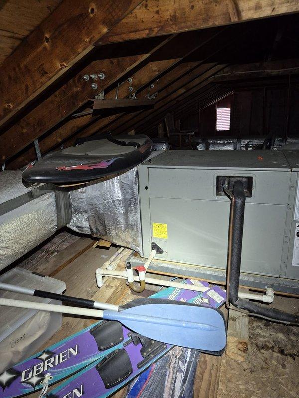 Responded to no cooling complaint with evaporator coil icing. Upon arrival, confirmed unit had been shut off with fan running to allow ice to melt per phone instructions. Inspected attic-mounted air handler and associated ductwork, documented equipment condition with photos. Provided replacement system estimate to customer as requested due to ongoing performance concerns.