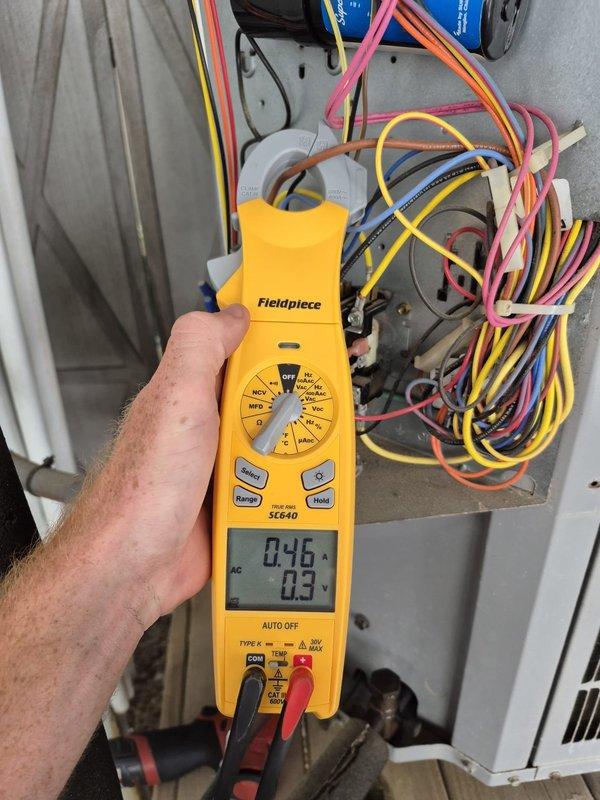 Performed routine cooling maintenance visit on residential HVAC system. Conducted electrical diagnostics using digital multimeter, measuring voltage and amperage at the control board and verifying proper capacitor operation. All electrical components tested within normal operating parameters, and system confirmed to be functioning correctly for the cooling season.