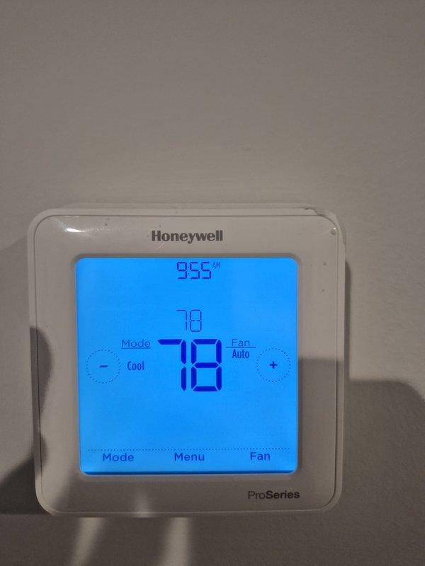 Completed preventive maintenance cooling visit on two HVAC systems. Verified thermostat operation showing system cooling to setpoint of 78°F in auto fan mode. Performed electrical diagnostics on rooftop unit, measuring amperage draw of 38.1A and voltage readings to confirm proper compressor and system operation within manufacturer specifications.