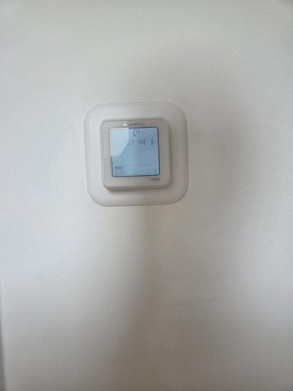 Responded to cooling complaint for lower floor system not maintaining temperature. Performed diagnostic evaluation of HVAC system and verified thermostat operation showing 77°F ambient temperature with system in cooling mode. Identified and resolved issue affecting cooling performance, confirmed proper thermostat communication and system cycling, and verified adequate airflow with existing filters onsite.
