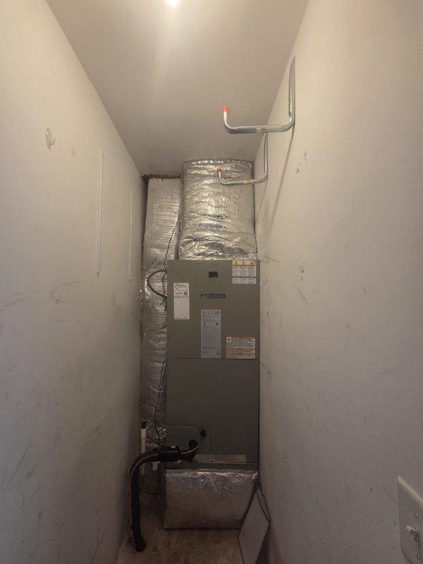Completed full HVAC system replacement including removal and disposal of existing equipment. Installed American Standard 3.0 ton 14.3 SEER heat pump (model 5A6H4036) on exterior platform with electrical whip and disconnect, connected via 35' refrigeration lines to new variable speed fan coil unit (model 5TEM6D04) in interior mechanical closet. Fabricated and installed new return plenum with 10x10 hard duct connection from existing ceiling ductwork, supply plenum with hard duct transition to 16" flexible ductwork at ceiling, sealed all plenum penetrations with caulk. Added 10KW electric heat kit with dedicated breaker, 1" filter rack, and WiFi-enabled thermostat for complete climate control. System tested and operational.