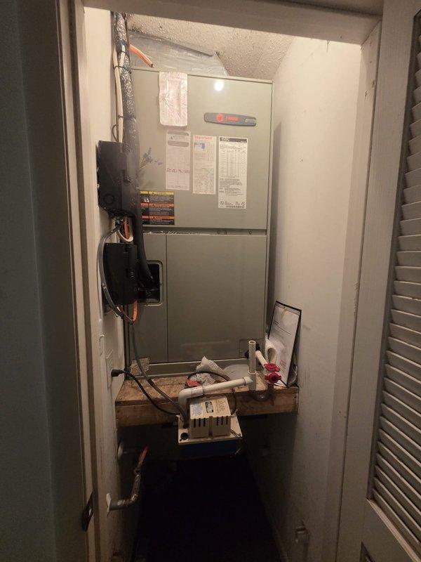 Responded to no heat call on residential HVAC system over 10 years old. Upon arrival, found thermostat set to 69°F with actual room temperature at 74°F. Accessed utility closet housing wall-mounted furnace/air handler unit and performed diagnostic evaluation. Inspected electrical connections and wiring at unit, identifying loose or compromised wire connections secured with wire nuts. Reconnected and properly secured all electrical wiring to ensure safe operation and restore heating functionality. Verified proper electrical continuity throughout system. Cycled unit through heating mode to confirm successful restoration of heat. System operating within normal parameters at time of departure.