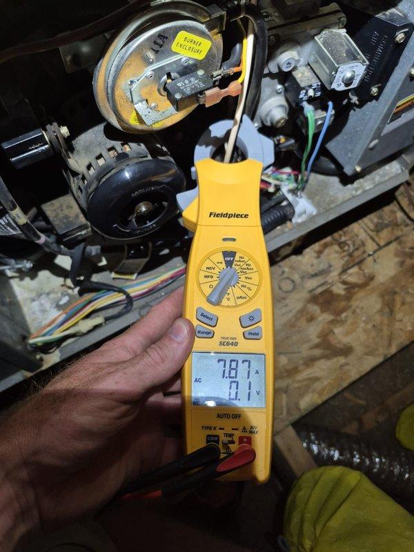 Completed scheduled cooling maintenance visit on residential HVAC system. Performed electrical diagnostics on gas heating components, measuring amperage draw of 7.07A to verify proper operation of system controls and safety devices. Confirmed Nest thermostat functioning correctly with cooling mode set to 71°F and verified proper communication between thermostat and HVAC equipment.