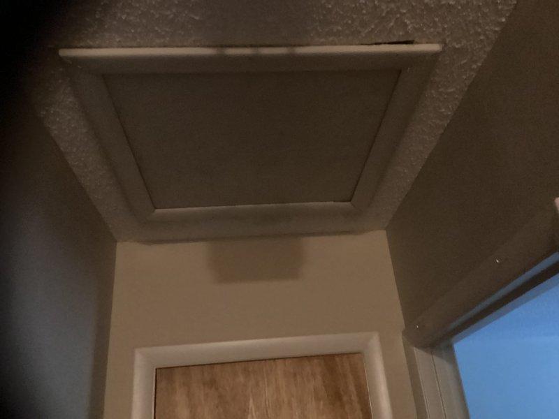 Responded to service call for 18-year-old Custom Comfort HVAC system requiring replacement estimate. Added refrigerant to existing system to maintain temporary operation until replacement can be scheduled. Documented outdoor condenser unit condition and indoor system location with photographs for estimate preparation.
