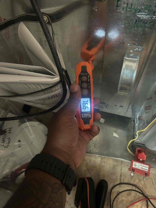 Replaced failed high pressure switch on York downstairs outdoor unit, model YCE30B22SA. System had been left with nitrogen holding charge from previous diagnostic visit. Recovered nitrogen, installed new high pressure switch, evacuated system, and recharged with proper refrigerant. Verified system operation with temperature readings showing 65.6°F and 53.7°F at tested points. Unit restored to normal operating condition.