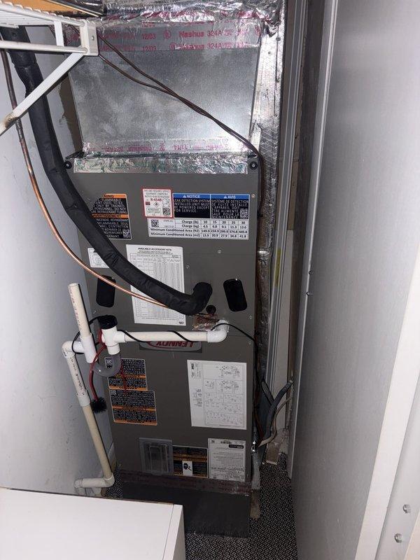 Completed full HVAC system replacement including removal and disposal of existing equipment. Installed new Lennox ML14KP1-036 3-ton 14 SEER heat pump outdoor unit on existing platform, Lennox CBK45UHET-036 air handling unit in interior closet space, 10kW electric heat kit (downgraded from existing 15kW), and Honeywell digital WiFi thermostat. Fabricated and installed metal duct transitions to adapt new equipment to existing ductwork. Replaced outdoor electrical disconnect and whip while reusing existing electrical service, refrigerant lines, and condensate drainage lines. Verified all connections, tested system operation, and confirmed proper heating and cooling functionality. Extended protection plan one year from current expiration date.