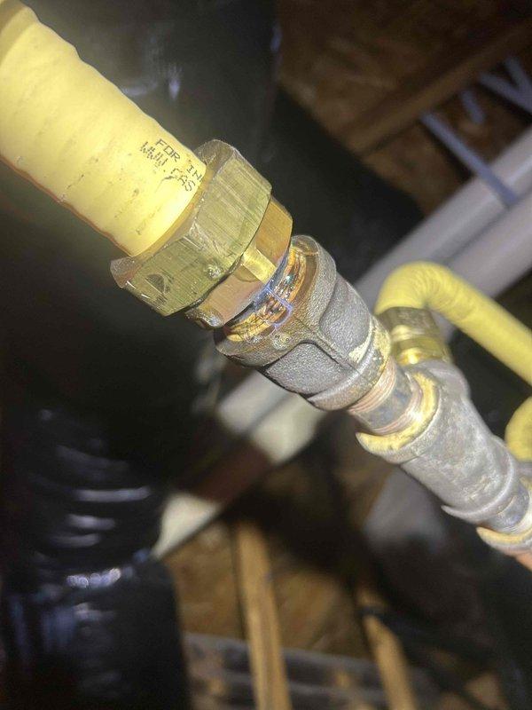 Completed scheduled cooling maintenance visit on residential HVAC system. Inspected gas meter installation and associated flexible gas line connections serving the heating equipment, verifying all brass compression fittings and CSST (corrugated stainless steel tubing) connections were secure and properly installed. All yellow flexible gas lines and metallic corrugated hoses showed appropriate connections with no visible signs of damage or leakage. System components were found to be in satisfactory operating condition.