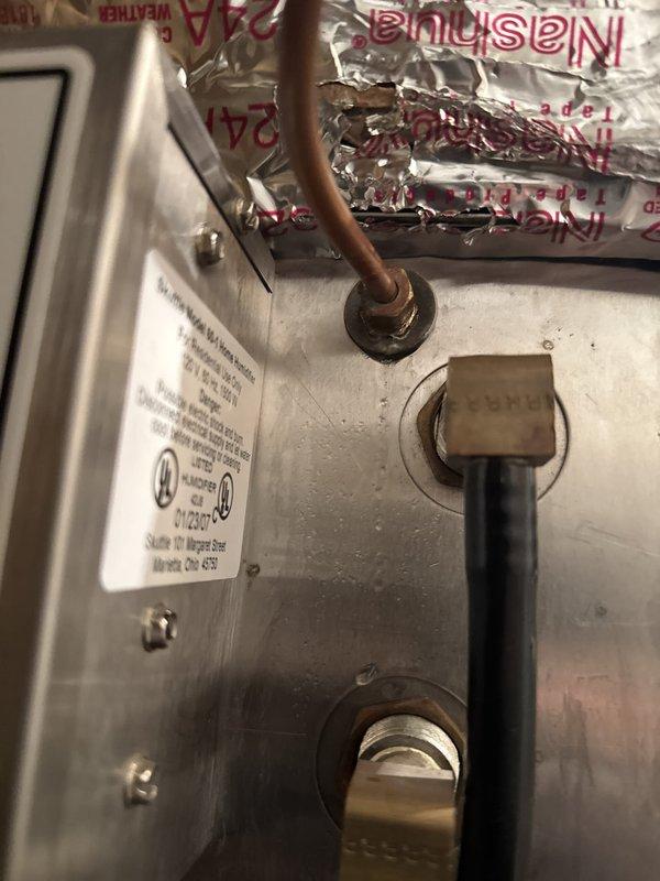 Completed full dual-zone HVAC system replacement with removal and disposal of existing equipment. Downstairs installed Lennox EL297UH090V48 90,000 BTU variable speed two-stage furnace configured as dual fuel system with Lennox EL19KPV-048 4-ton 19 SEER variable speed heat pump, CK40CT-50/60C evaporator coil, LP conversion kit, and Honeywell S1200 WiFi thermostat. Reused existing Skuttle humidifier system with filter located at unit. Upstairs installed Lennox EL19KPV-048 4-ton 19 SEER variable speed heat pump with CBK45UHVT-048 variable speed air handler, 15kW electric heat pack, Honeywell S1200 digital thermostat, and filter at unit. Fabricated and installed metal duct transitions to adapt new equipment to existing ductwork on both systems. Reused existing electrical service, condensate lines, and power lines where applicable. Replaced outdoor disconnect and electrical whip for both outdoor units. Positioned outdoor units on existing equipment stands. Verified system pressures with dra