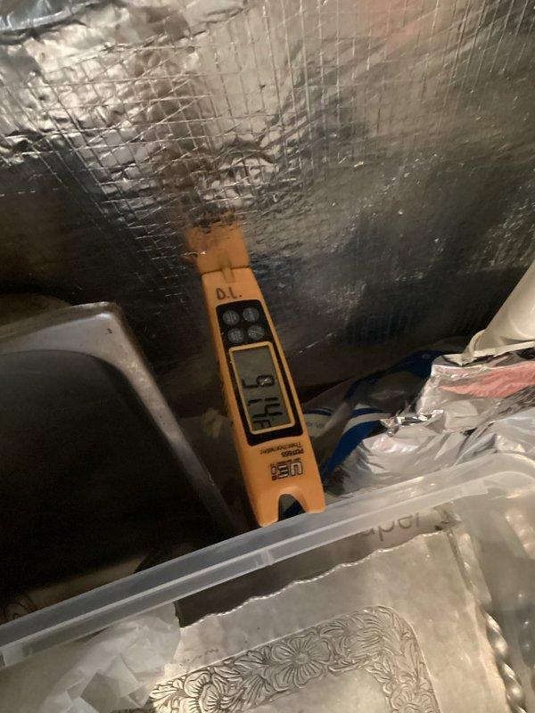Responded to emergency no-cooling call on older residential air conditioning system. Upon arrival, confirmed complete system failure with no power to outdoor condensing unit. Performed diagnostic evaluation of electrical components and identified failed dual-run capacitor as root cause of system outage. Capacitor tested at 7.5/10 MFD showed zero capacitance on both common and hermetic terminals, preventing compressor and condenser fan motor operation. Replaced defective capacitor with properly rated OEM equivalent unit, verified all electrical connections at contactor and terminal block, and restored power to system. Cycled unit through complete startup sequence, confirmed compressor engagement, verified proper condenser fan operation, and tested system amperage draw within manufacturer specifications. System returned to normal cooling operation with no further issues observed.