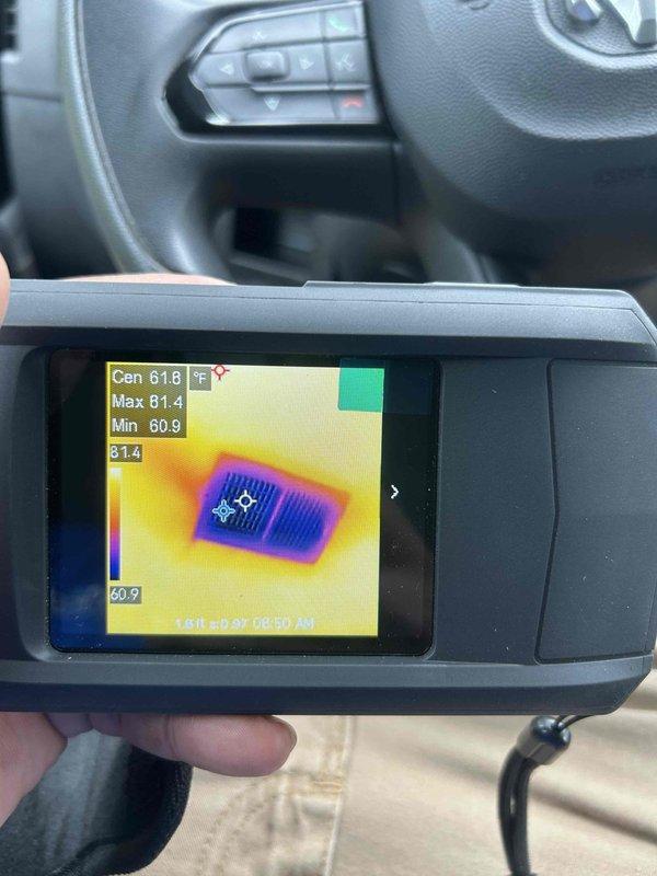 Responded to no cooling call on residential HVAC system. Upon arrival, performed electrical diagnostics using digital multimeter to test voltage and amperage at outdoor unit. Readings indicated potential compressor or electrical issue. Utilized thermal imaging camera to assess temperature differentials across system components, with thermal scan showing center temperature of 61.8°F and minimal temperature variance between components. Documented findings with photos for service records. Customer made aware of diagnostic results and repair options for restoring cooling operation to system.