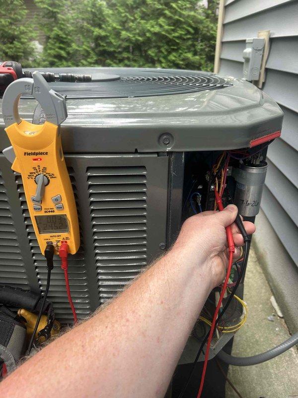 Responded to no cooling complaint on outdoor condensing unit. Upon arrival, found compressor not operating. Performed electrical diagnostics using digital multimeter to test capacitor and verify voltage at compressor terminals. Measured capacitance values and checked for proper voltage supply to compressor contactor. Identified compressor failure as root cause of system malfunction. Unit requires compressor replacement to restore cooling operation.