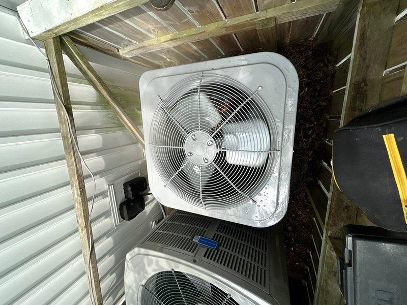 Completed full HVAC system replacement including removal and disposal of existing equipment. Installed new Carrier 27SCA536A003 3-ton 15 SEER heat pump outdoor unit on existing stand with replacement of outdoor disconnect and electrical whip. Installed Carrier FJ5ANXB36L00 air handling unit with ECM motor and Carrier FF2601C10 10kw electric heat pack. Fabricated and installed metal duct transitions to adapt new equipment to existing ductwork. Reused existing electrical connections, condensate lines, and power lines where applicable. Installed 14x30x1 filter grille and Honeywell TH6320WF digital WiFi thermostat for system control. System tested and confirmed operational upon completion.