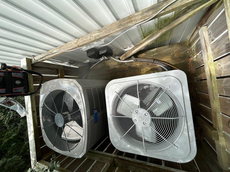 Completed full HVAC system replacement including removal and disposal of existing equipment. Installed new Carrier 27SCA536A003 3-ton 15 SEER heat pump outdoor unit on existing stand with replacement of outdoor disconnect and electrical whip. Installed Carrier FJ5ANXB36L00 air handling unit with ECM motor and Carrier FF2601C10 10kw electric heat pack. Fabricated and installed metal duct transitions to adapt new equipment to existing ductwork. Reused existing electrical connections, condensate lines, and power lines where applicable. Installed 14x30x1 filter grille and Honeywell TH6320WF digital WiFi thermostat for system control. System tested and confirmed operational upon completion.