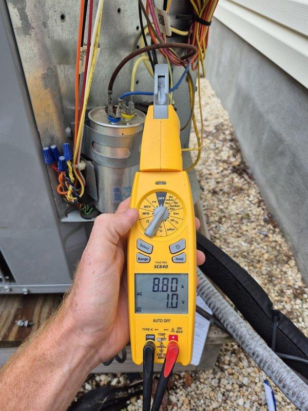 Completed routine cooling maintenance visit on residential air conditioning system. Performed electrical diagnostics using digital multimeter, testing capacitor functionality and verifying proper voltage readings across all electrical components within the outdoor condensing unit. All measurements indicated normal operating parameters, and system was found to be functioning properly with no issues identified requiring immediate attention.