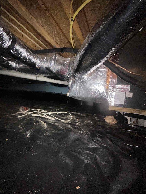 # HVAC Service Call - No Cooling Issue

Responded to service call for unit not maintaining set temperature. Upon arrival, performed diagnostic evaluation of system located in attic space. Inspected ductwork configuration including both rigid and flexible sections with reflective insulation. Examined air handler and associated electrical components mounted in attic crawl space. Verified proper duct connections and assessed overall system integrity. Checked electrical wiring, conduit routing, and junction box connections serving the HVAC equipment. Evaluated emergency shut-off controls and system safety devices. Customer was informed of diagnostic findings and provided repair options with associated discount. System requires additional repairs to restore proper cooling function.