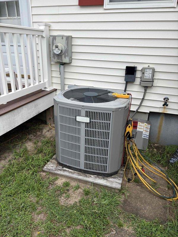 Responded to water leak complaint in ceiling. Inspected both HVAC units on property and documented conditions with photos. Located outdoor condensing unit with service gauges attached during diagnostic process. Customer noted maintenance may be needed on both systems but time constraints prevented completion of preventive tune-up at this visit.