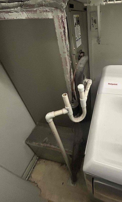 Responded to no cooling complaint on residential HVAC system. Upon inspection, found air handler operating in basement utility area with supply air temperature measuring 18.9°F at register, indicating system is cooling properly. Verified unit functionality, checked refrigerant operation, and confirmed adequate airflow throughout system with no issues detected at time of service.