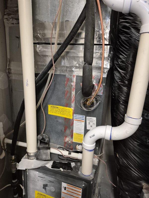 Responded to return service call for no cooling condition on residential HVAC system. Upon arrival, found Nest WiFi thermostat displaying OFF status with ambient temperature reading of 76°F. Inspected attic-mounted air handler unit and associated components including refrigerant lines, condensate drainage system, and ductwork. Verified thermostat communication with system and assessed equipment operation to diagnose cooling issue related to previous service visit. System evaluated and appropriate corrective measures taken to restore normal cooling function.