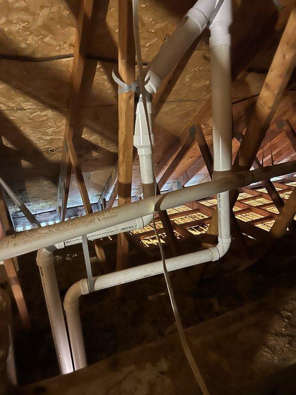 Removed and disposed of existing furnace and upgraded system to a high-efficiency 97% AFUE unit (model 59TP7A080V17) with LP conversion kit. Installed new PVC vent piping routed through attic space to accommodate condensing furnace requirements, utilizing existing evaporator coil, air conditioning equipment, and thermostat. Performed combustion analysis and verified draft pressure readings at 10.12 inches water column to ensure proper venting operation and system safety.